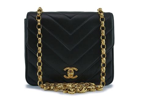 chanel bag black gold chain.